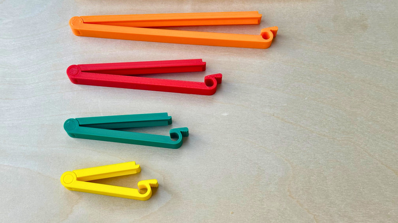 Индивидуальный дизайн зажима для сумки, напечатанный на 3D-принтере