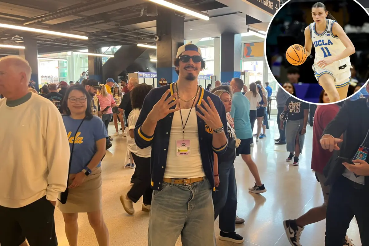 Хайме Хакес смотрит матч Калифорнийского университета в Лос-Анджелесе против Южной Каролины в национальном чемпионате