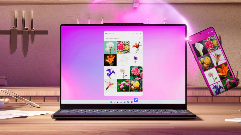 Yoga 9i 2-в-1 Aura Edition на кухонной стойке, зеркально отображающий экран телефона.