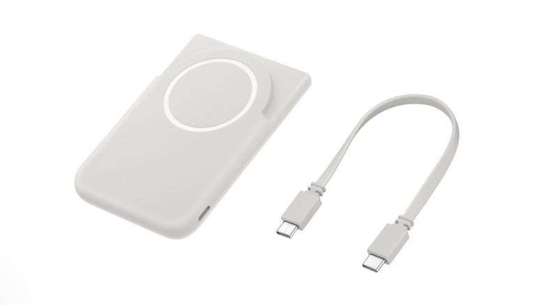 На изображении показано магнитное зарядное устройство Samsung и USB-кабель.