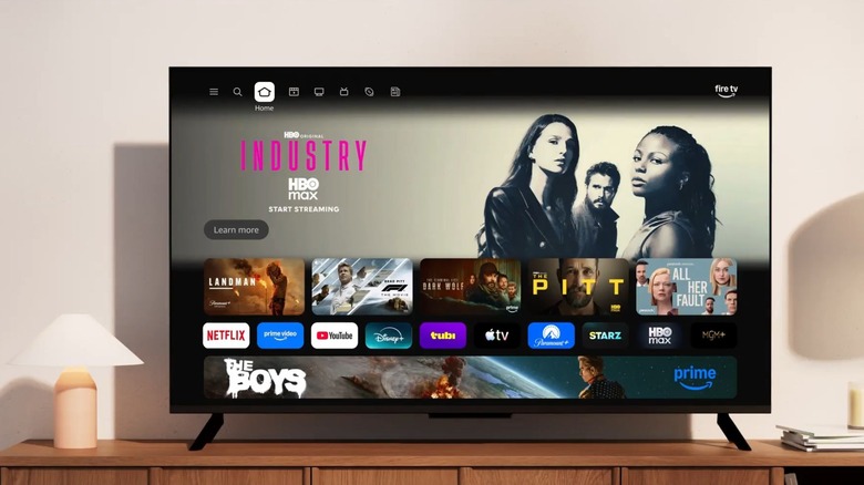Телевизор на подставке с интерфейсом Amazon Fire TV Stick.