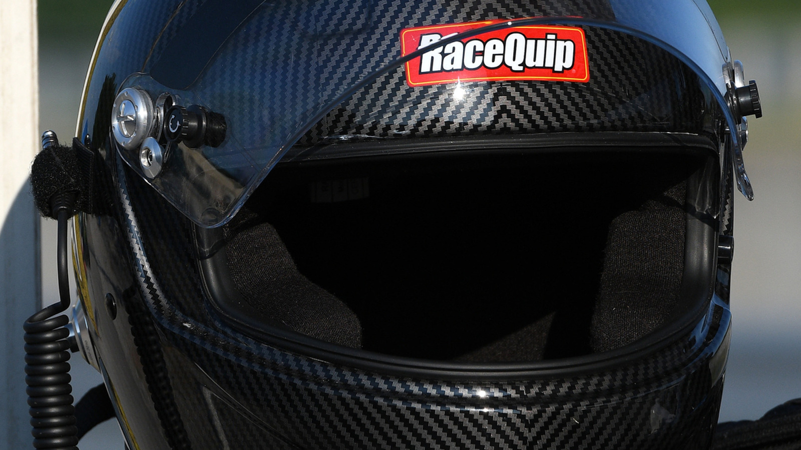 Кто производит шлемы RaceQuip и где они производятся?