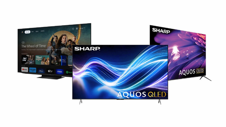 3 телевизора Sharp на белом фоне